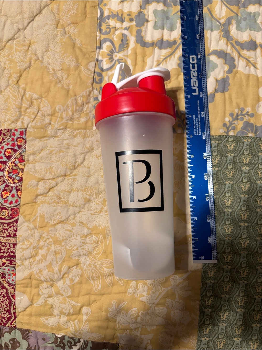 Protein Shaker Bottle with Red Lid and Black Logo